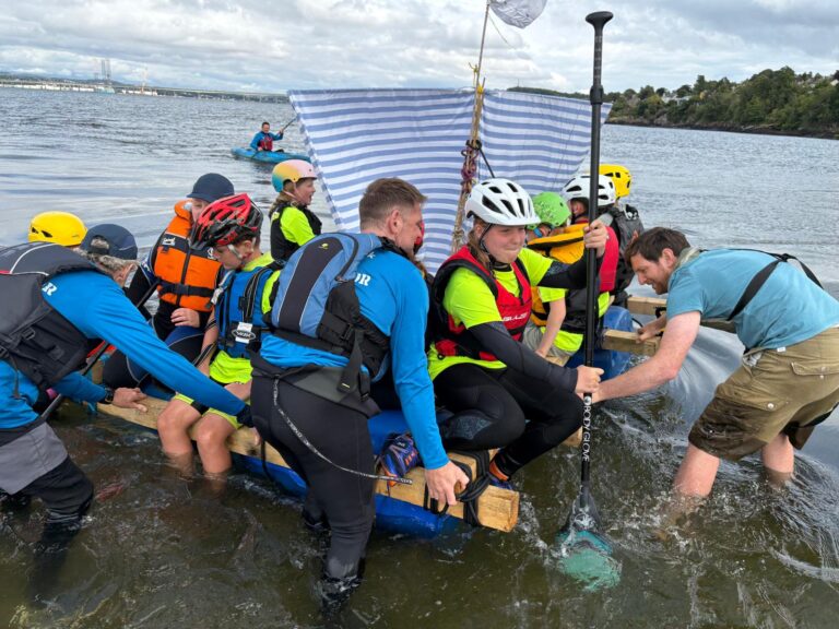 Children sailing and paddling on the River Tay during Wormit Boating Club Cadet Week
